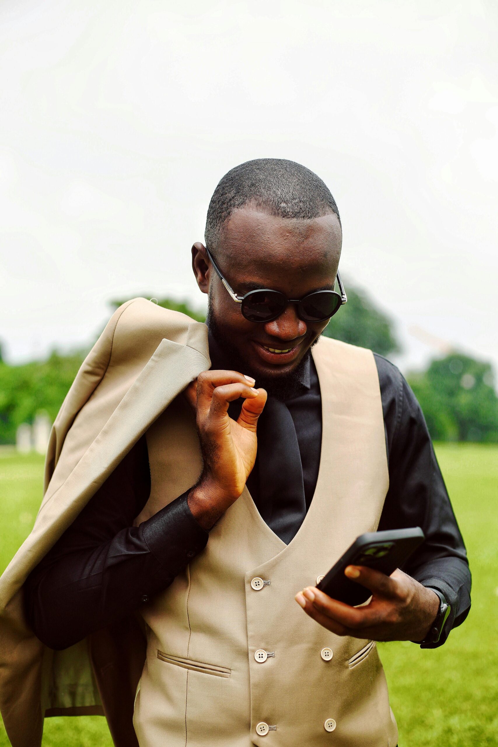 Business professional using advanced phone system in office